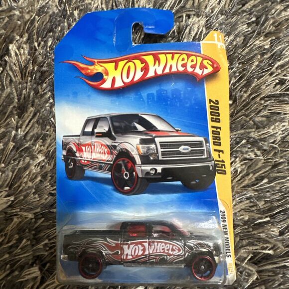 HOT WHEELS 2009 Ford F-150 Black with Red White & Silver 2009 New Models Ages 3+ - Picture 1 of 3
